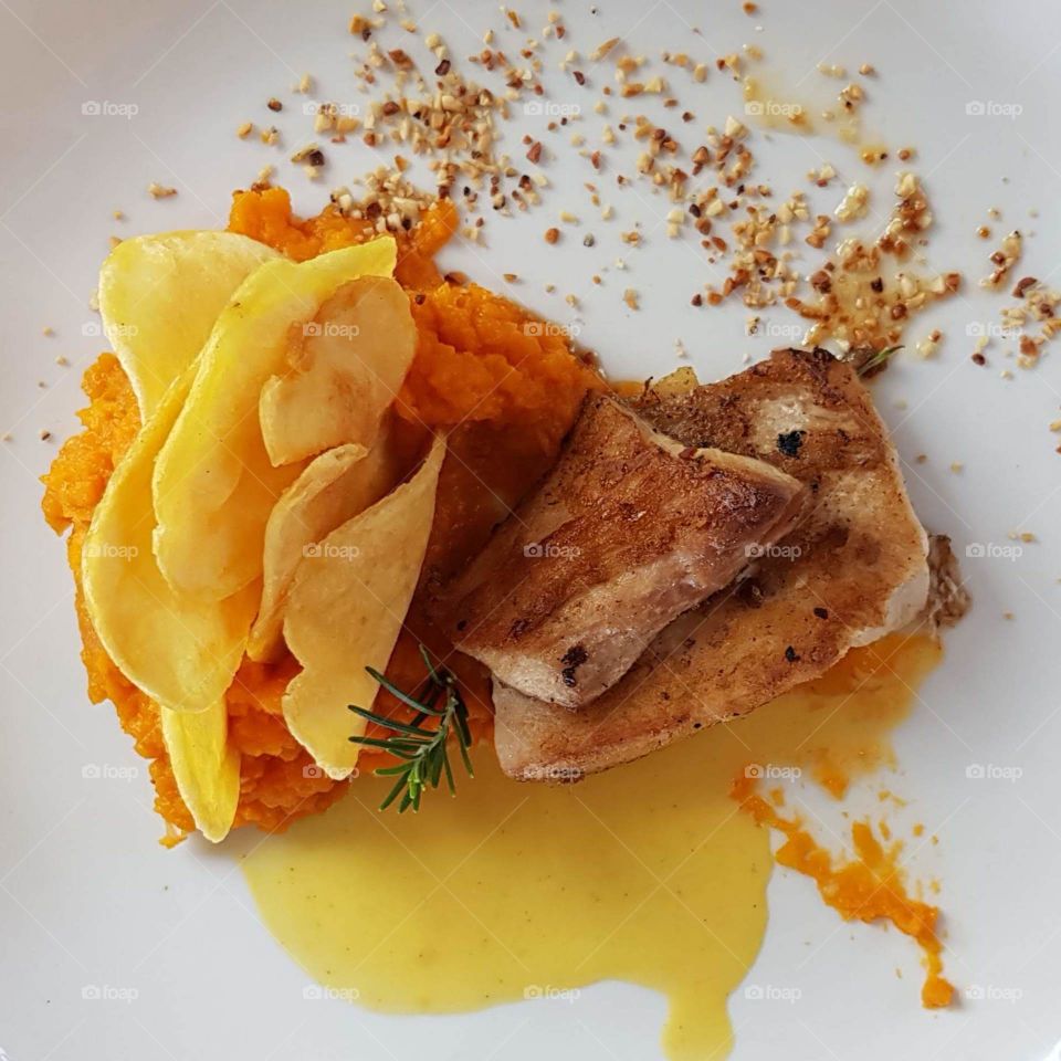 Fish and potato on the plate