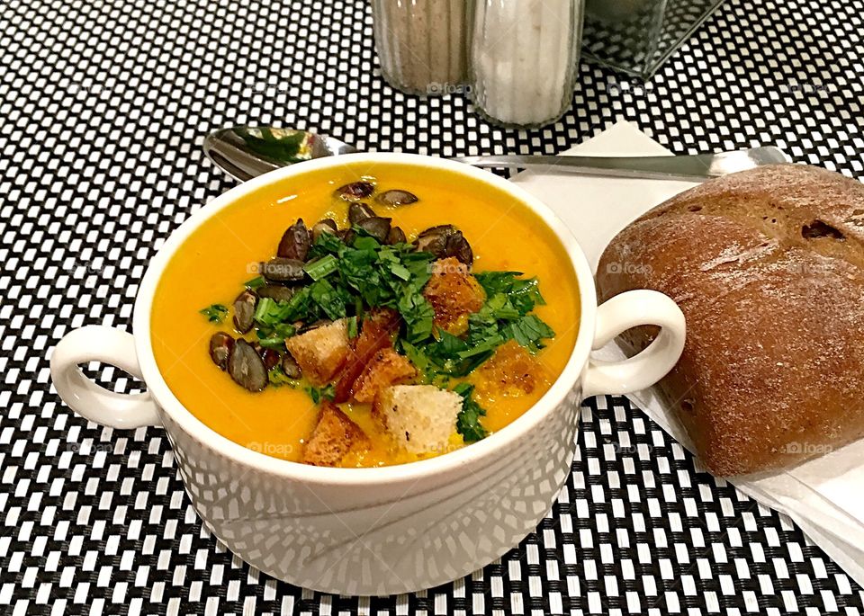 Close-up of soup with bread