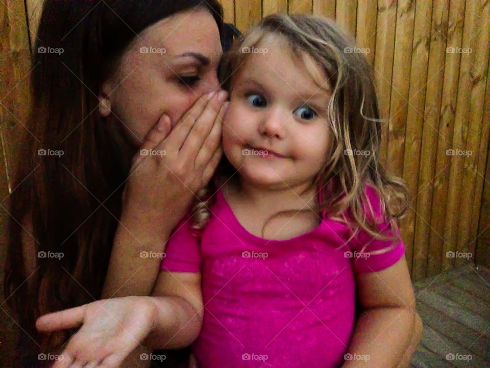 Close-up of mother and daughter