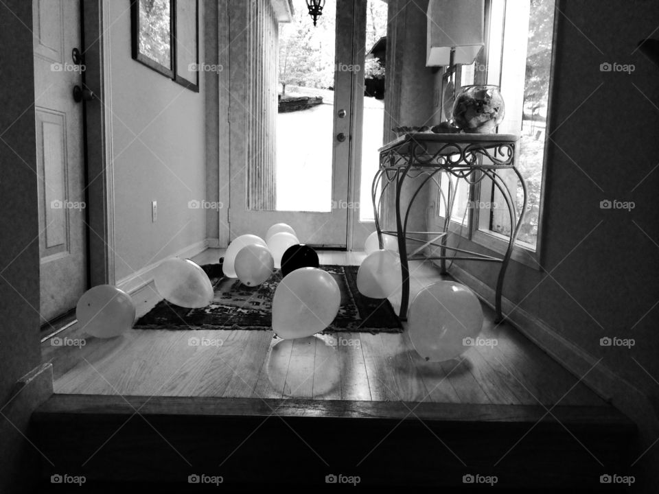 Party Coming. Lake House shenanigans with balloons and things. 