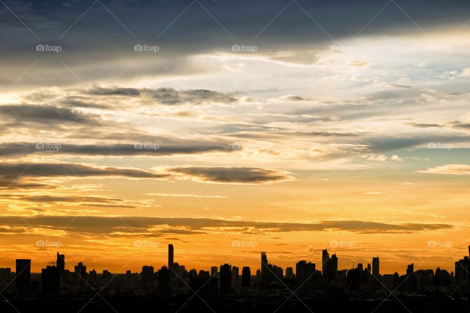 Twilight and fog cover skyscraper scape after rain in Bangkok Thailand