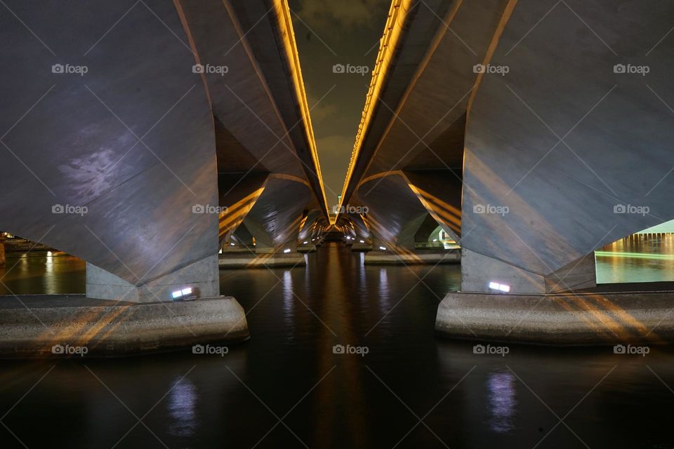 under the bridge at night time 