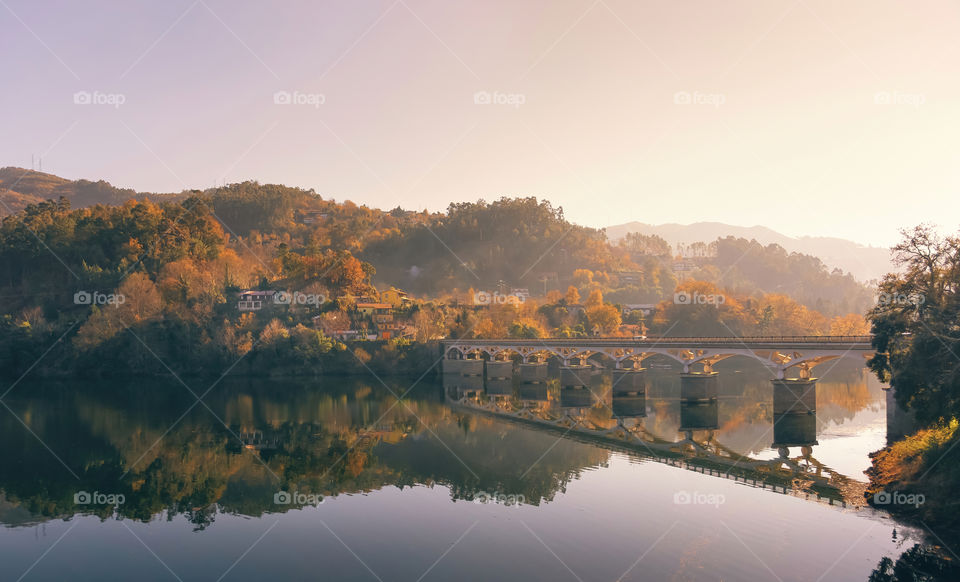 Misty scene - Bridge across Cavado river. Geres National Park, Portugal