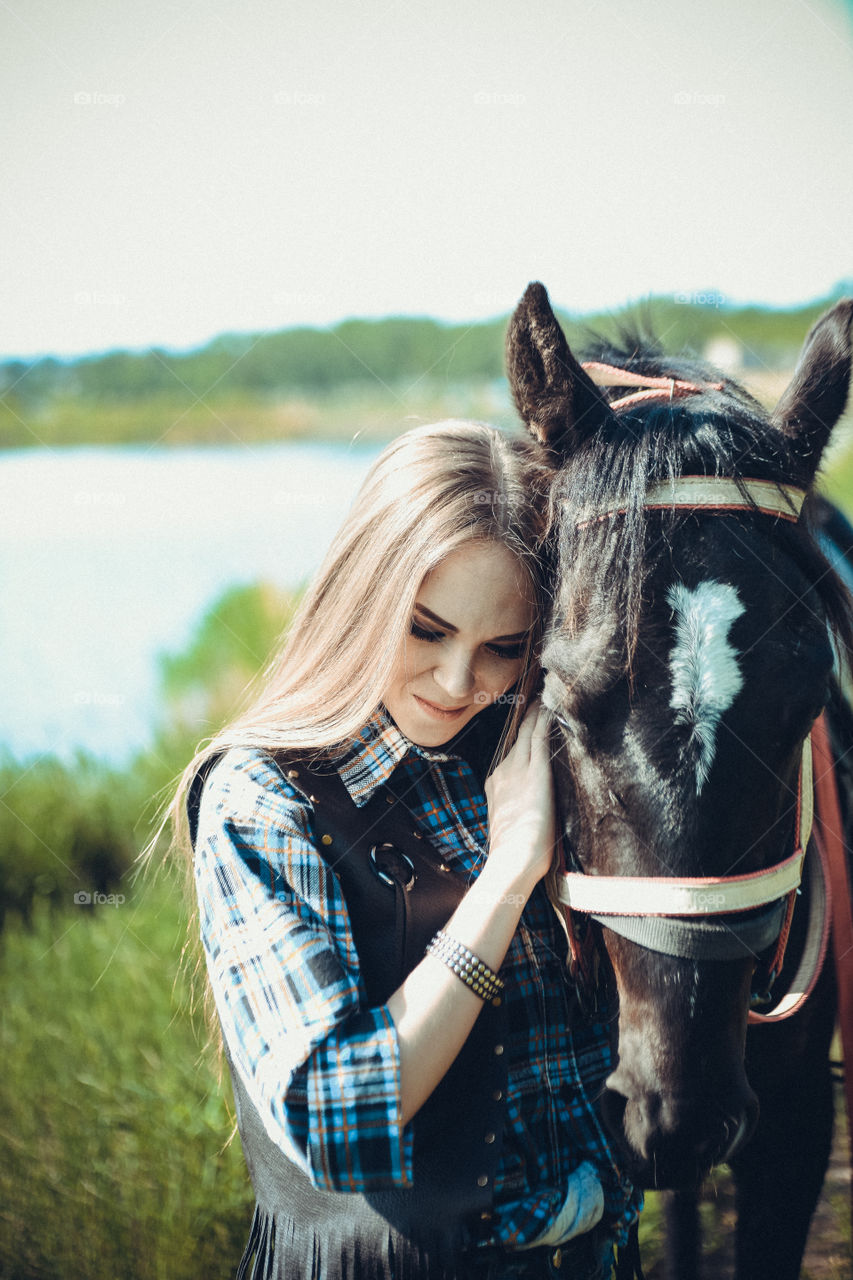 Woman loving her Horse